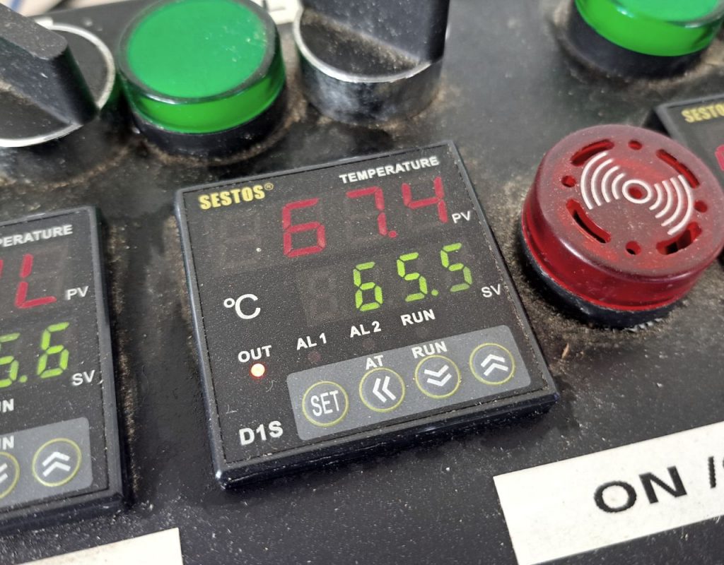 Image of DIY Distilling tring to ensure the mash stays at 67 degrees celcius